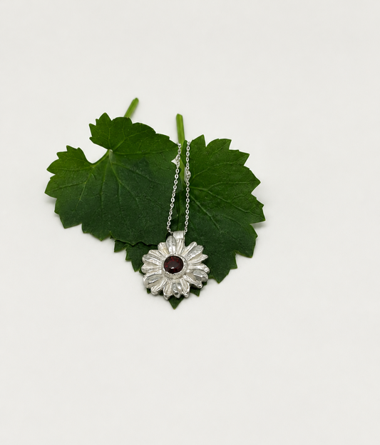Cleaned background, necklace resting on leaves