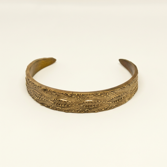 Cleaned bronze cuff on its own